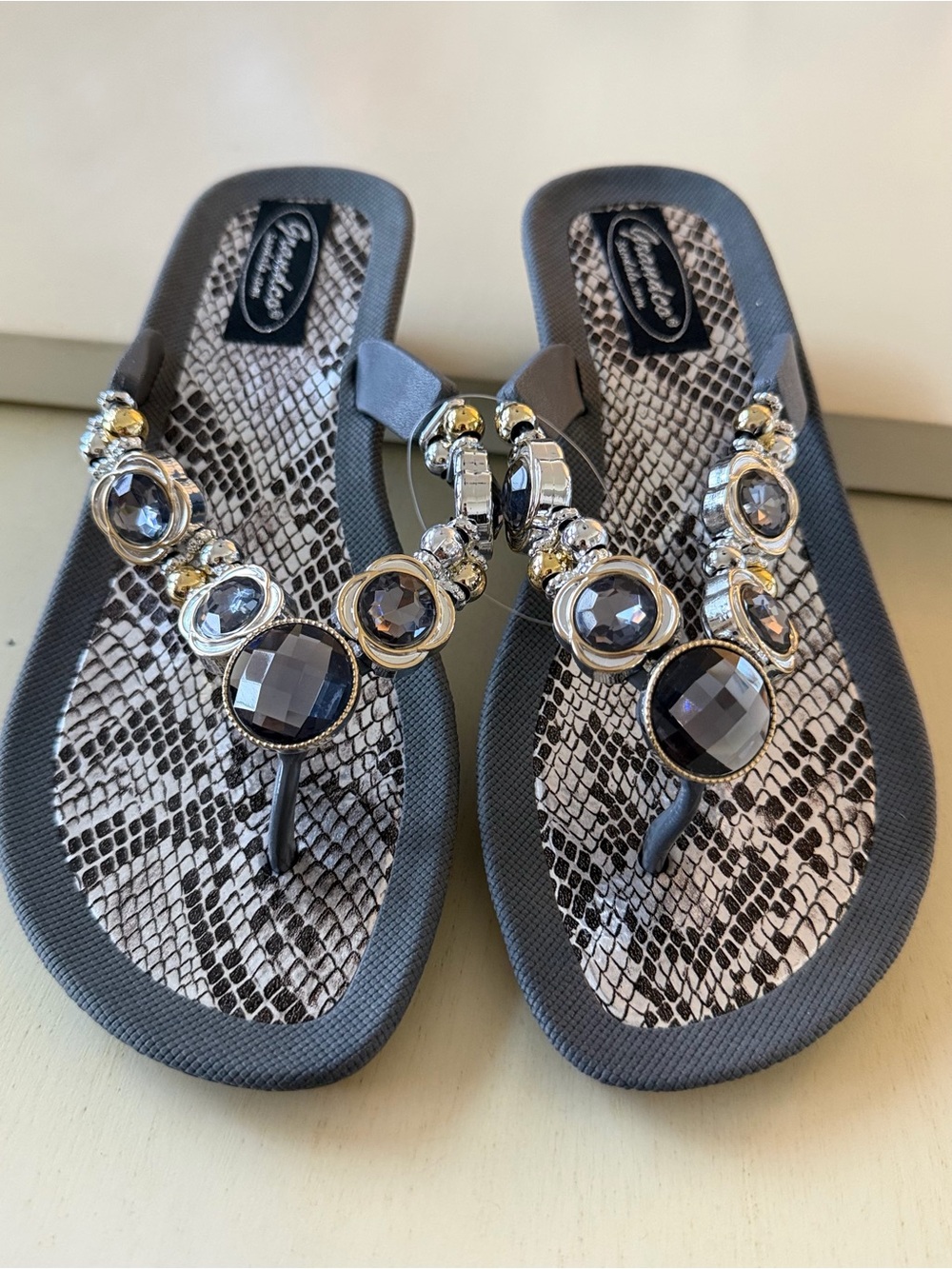 Glam Gemstone Gray Thong Sandals by Grandco